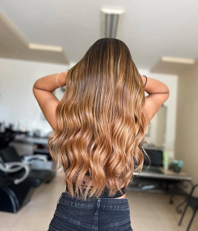 21. Golden Caramel Balayage with Loose Waves - Golden Caramel Hair Color