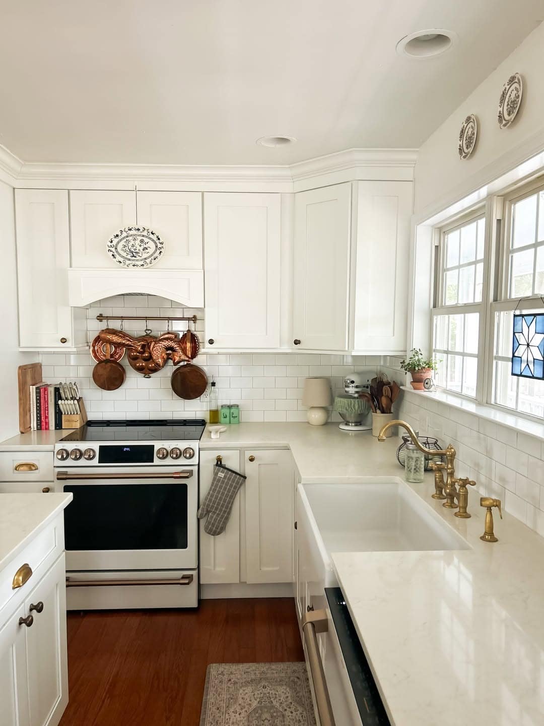 4. Classic White and Brass Cottage Kitchen Idea - cozy kitchen ideas