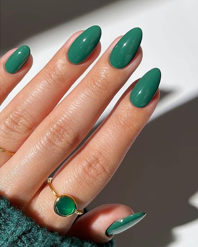 14. Glossy Emerald Green Almond Nails - pretty nail ideas