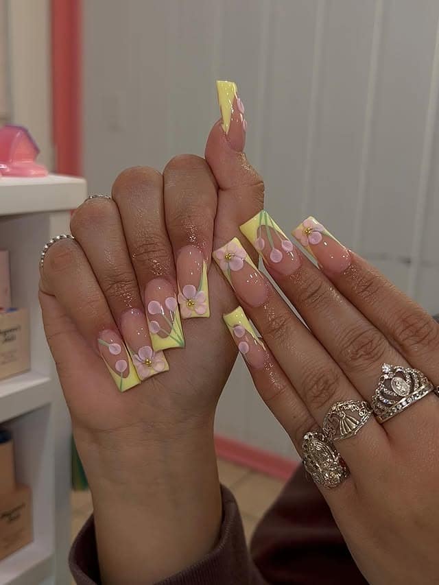 15. Pastel Yellow Floral Square Nails - square nail ideas
