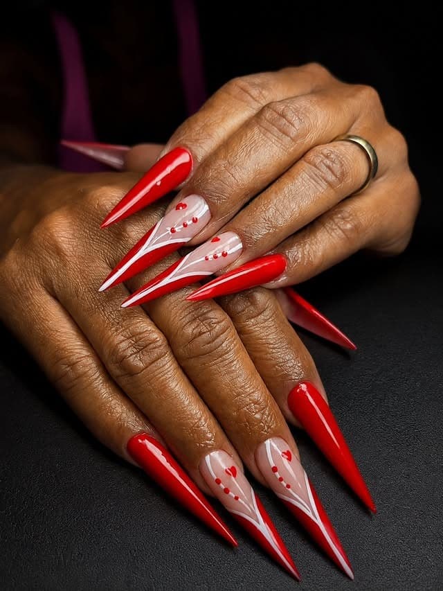 1. Red Heart Accent Stiletto Nails - stiletto nail ideas