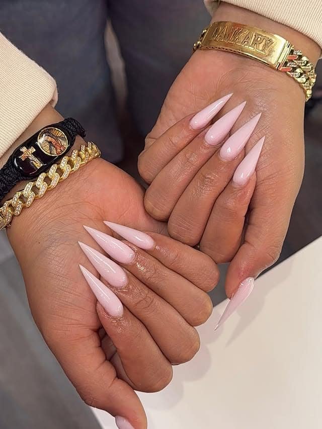 7. Milky Pink Ombre Stiletto Nails - stiletto nail ideas