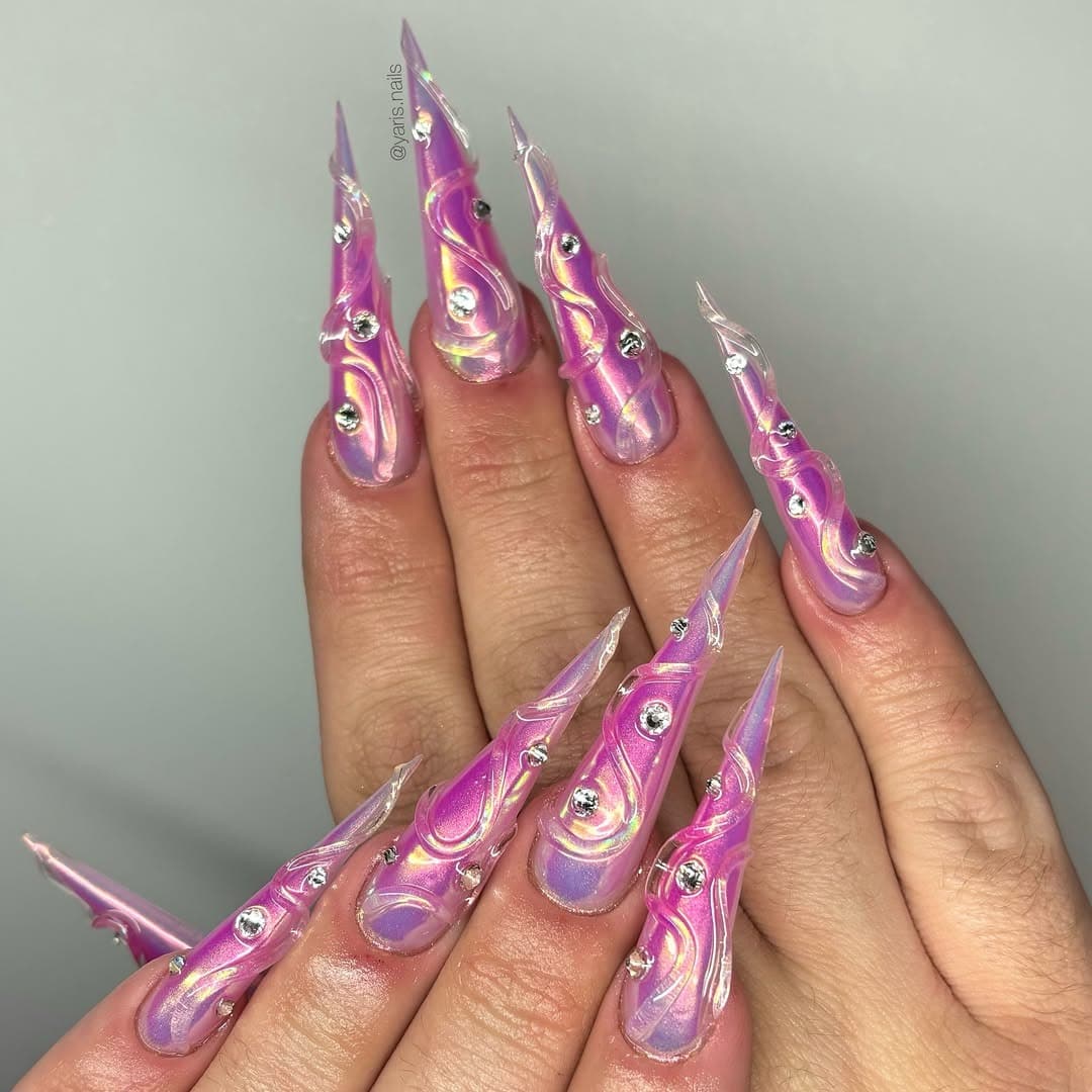 19. Iridescent Pink Chrome Sculpted Stiletto Nails - stiletto nail ideas