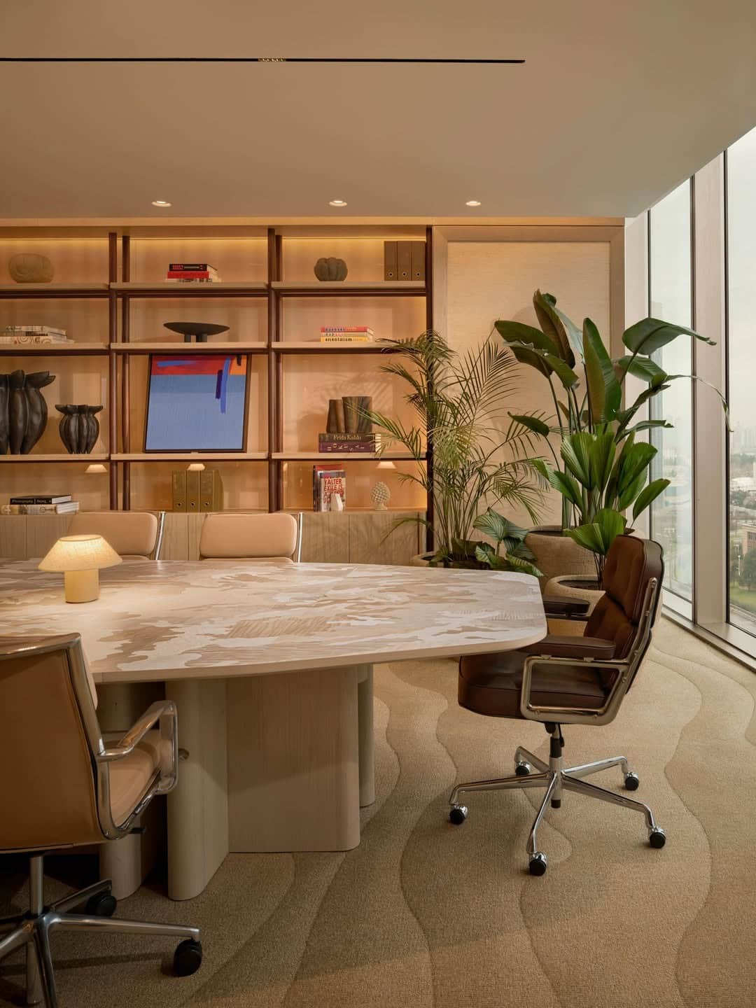 1. Light Beige Executive Office with Warm Wood Shelving - light colors office ideas