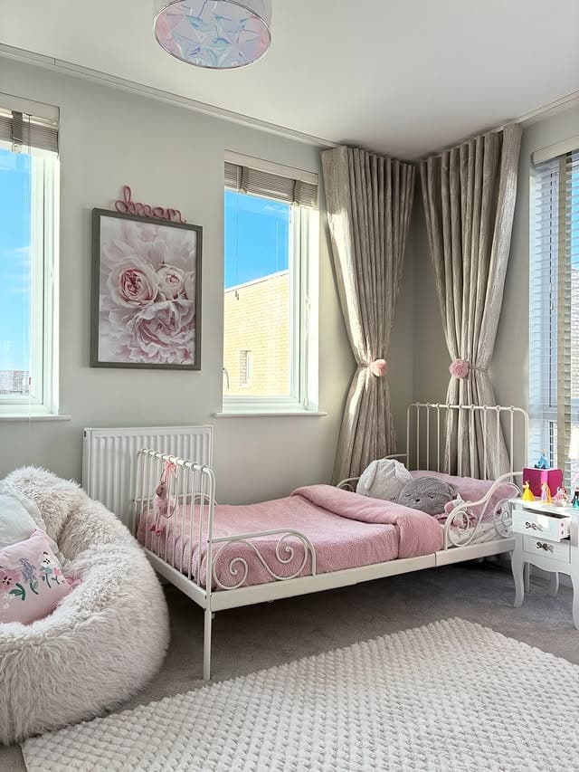8. Soft Pink Toddler Girls Bedroom with Iron Bed - girls bedroom ideas
