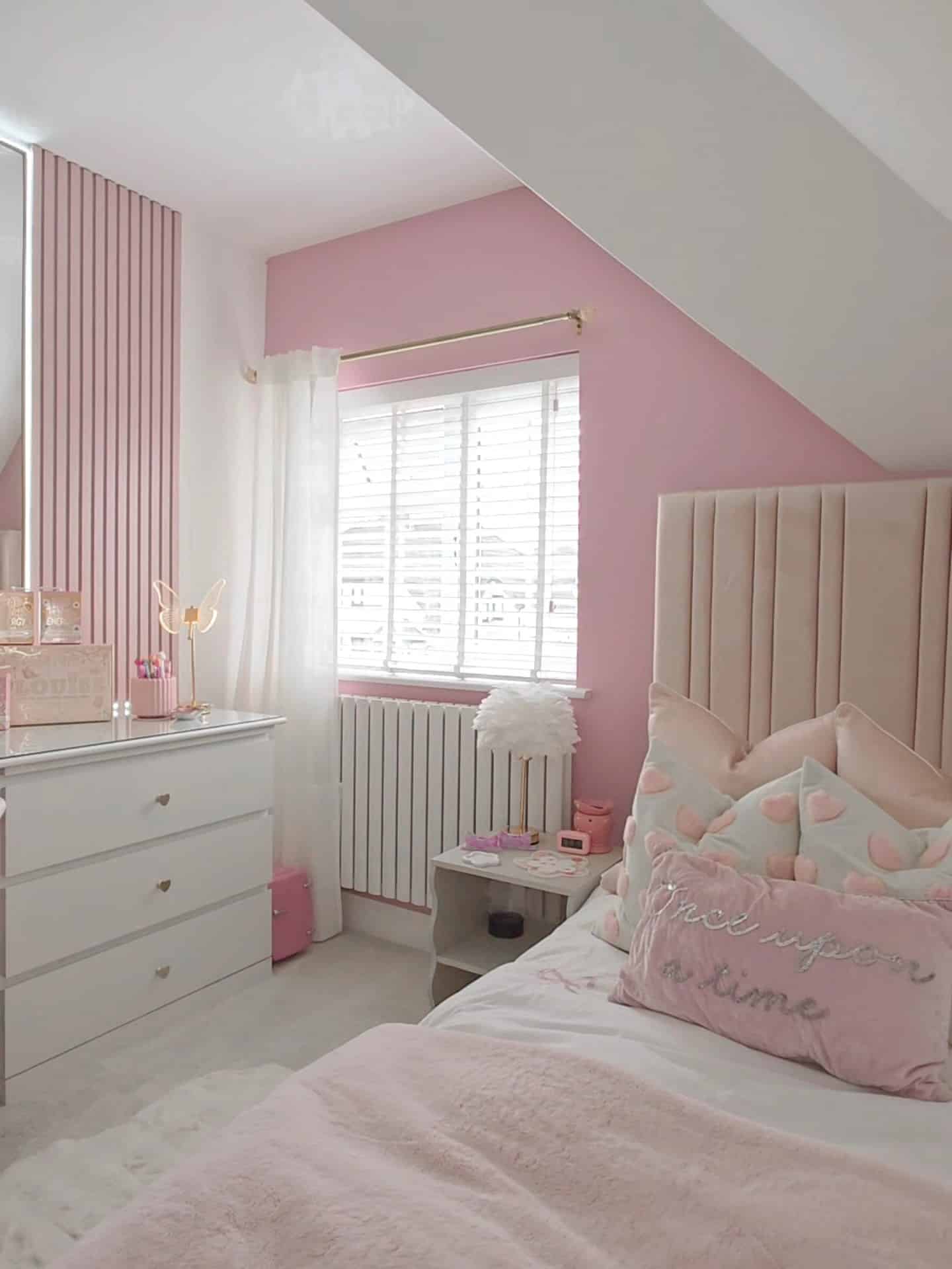 10. Blush Pink Attic Girls Bedroom with Modern Paneling - girls bedroom ideas