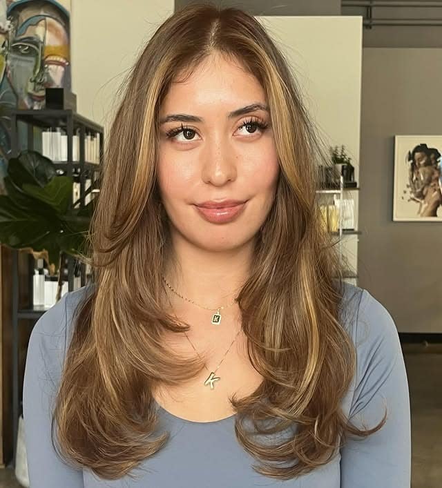 11. Layered Blowout with Caramel Honey Blonde Highlights - Caramel Honey Blonde