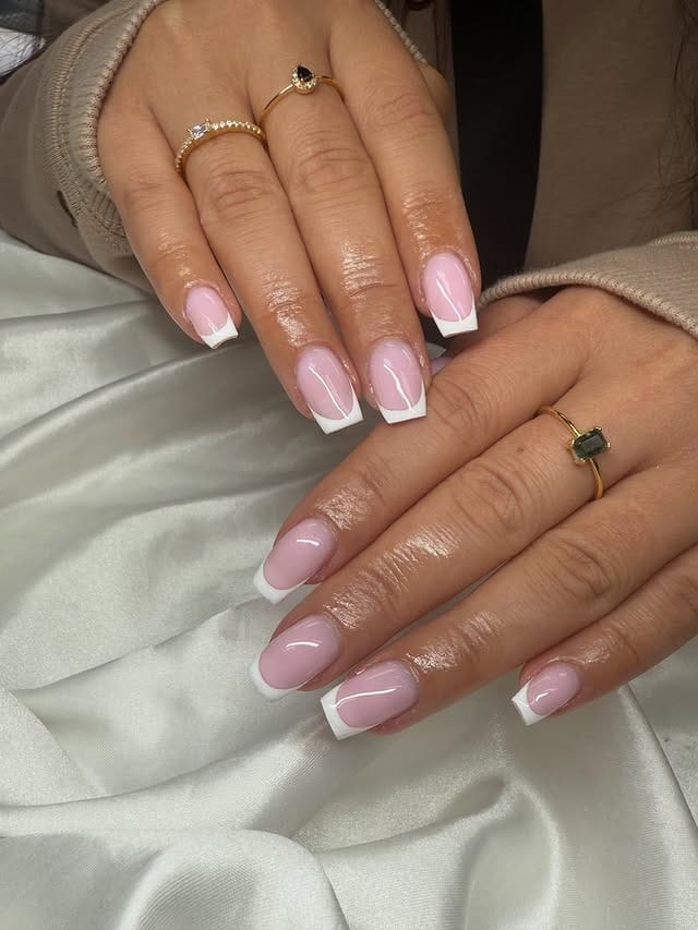 3. Glossy Baby Pink French Tip Nails - white tip nail ideas