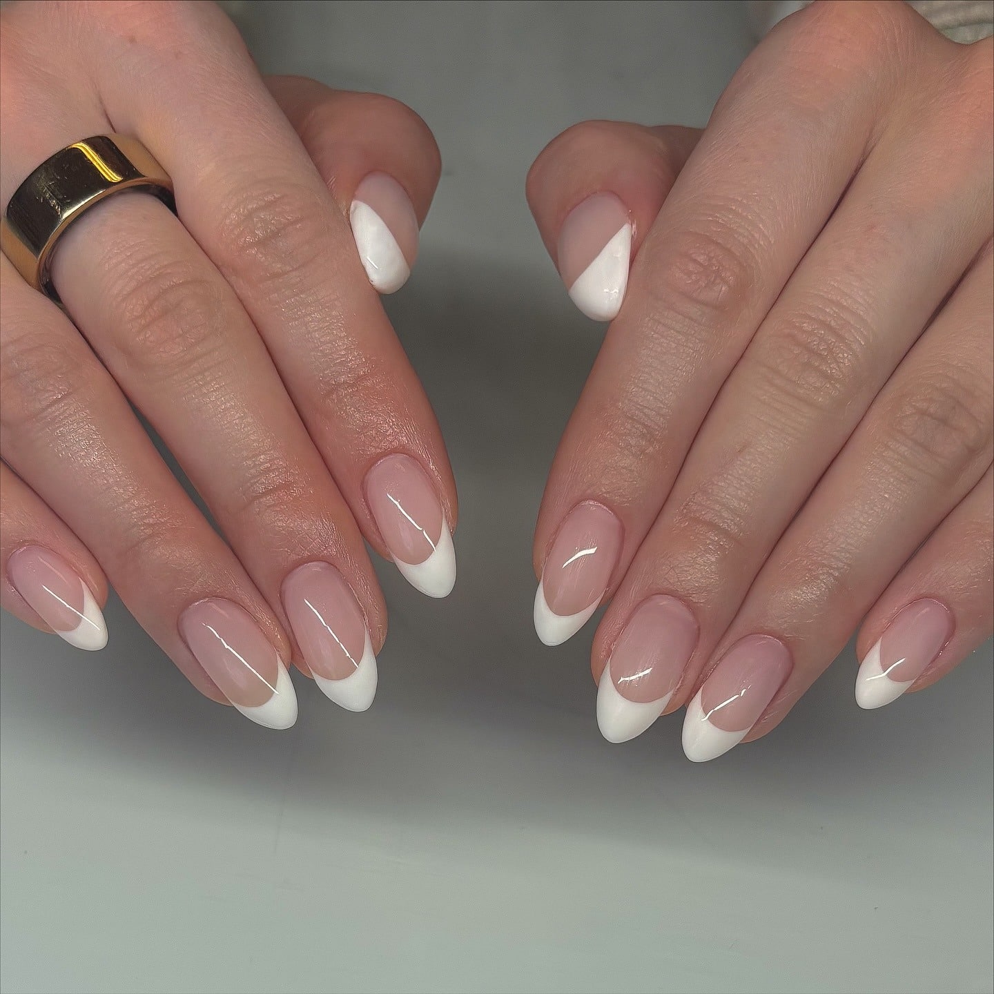 9. Classic White French Almond Nails - white tip nail ideas