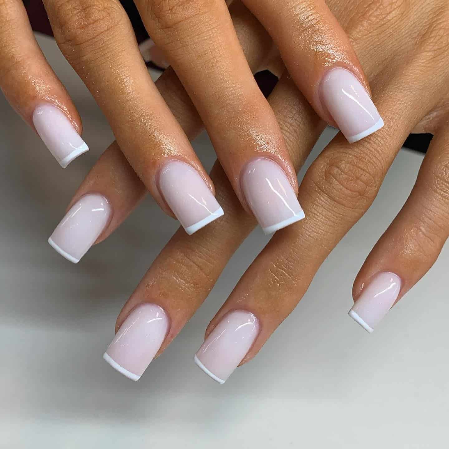 10. Soft Milky Pink Micro French Square Nails - white tip nail ideas