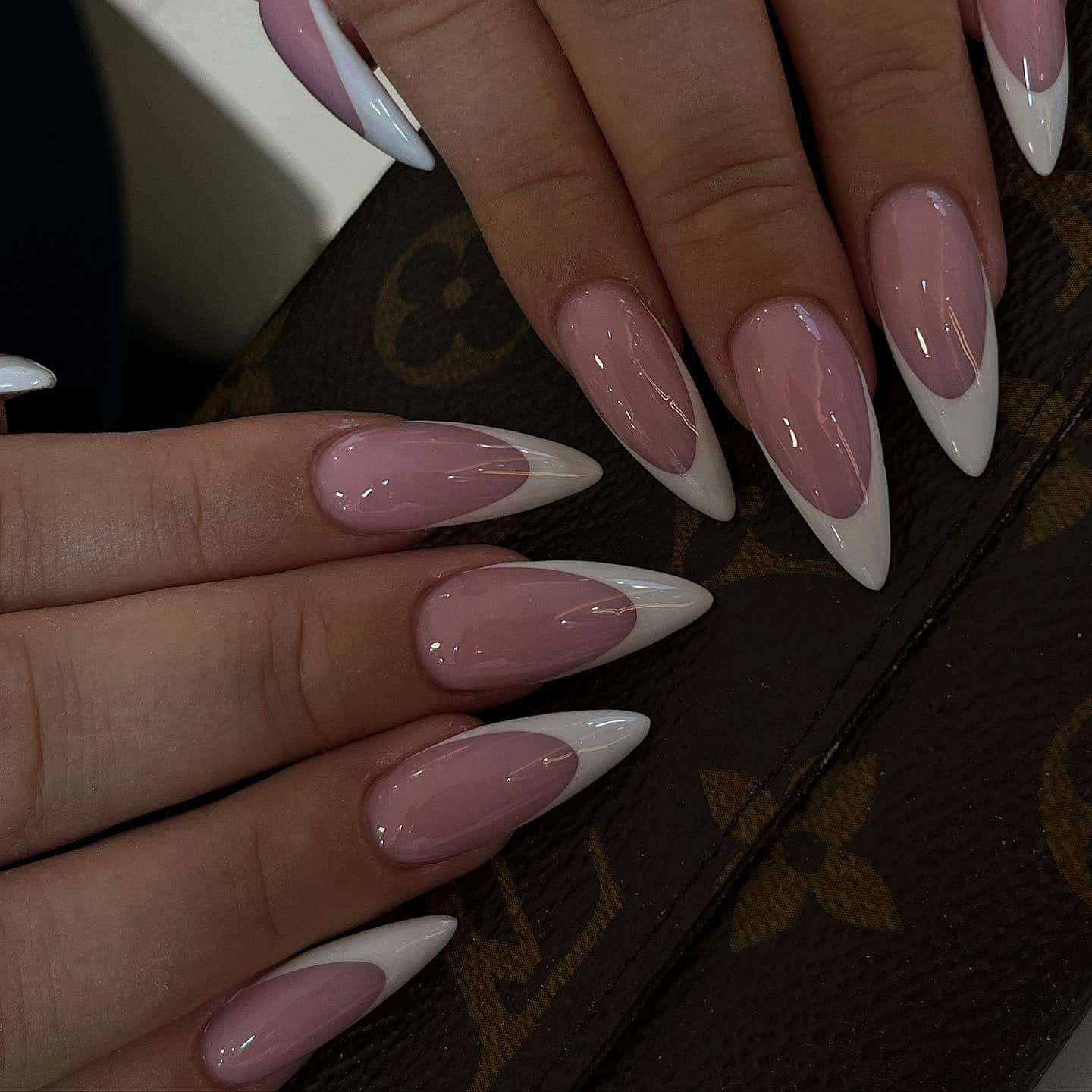 20. Glossy Pink White French Stiletto Nails - white tip nail ideas