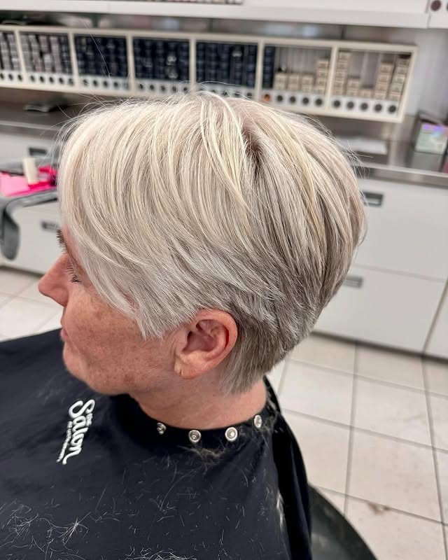 15. Sleek Silver Blonde Long Pixie - Long Pixie Cuts