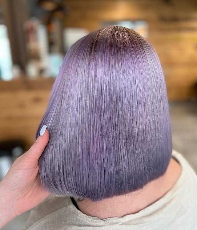 11. Sleek Lilac Precision Bob - Lilac Hair Color