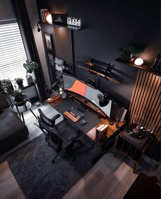 7. Dark Modern Wood & Black Gamer Studio - gamer office ideas