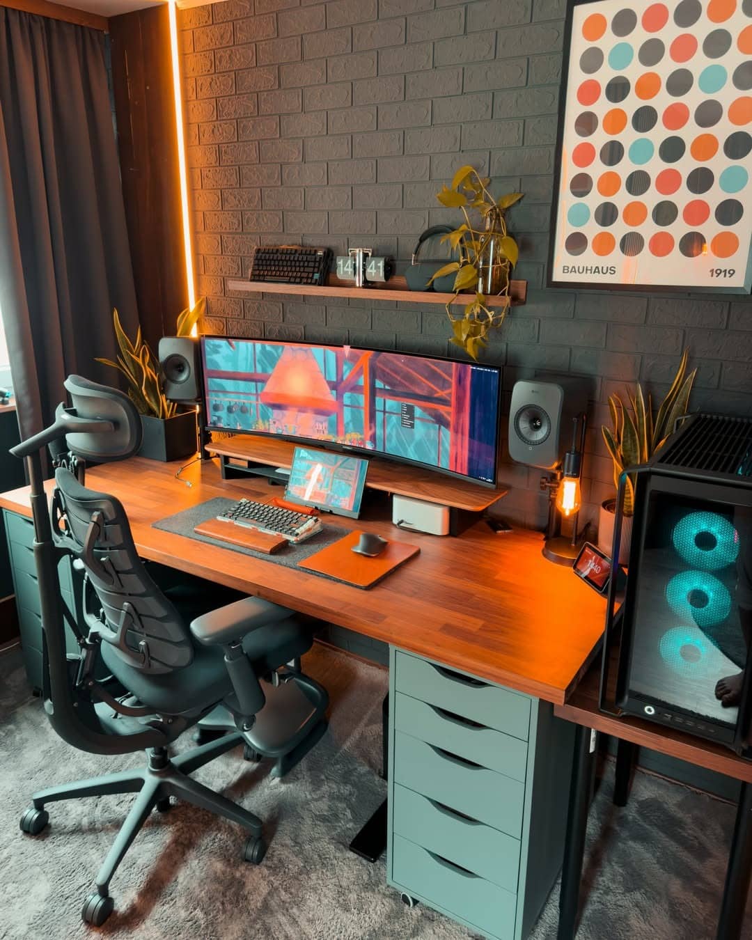 13. Charcoal Brick & Amber Modern Gamer Studio - gamer office ideas