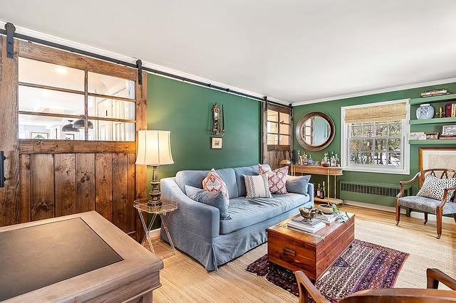 4. Forest Green and Rustic Wood Cottage Living Room - rustic living room ideas