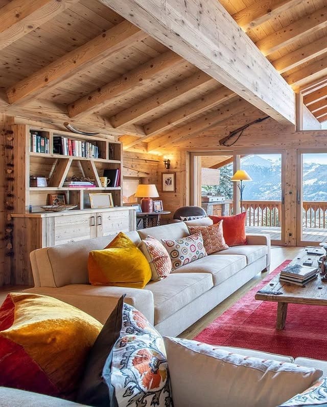 7. Honey Wood and Rustic Chalet Living Room - rustic living room ideas
