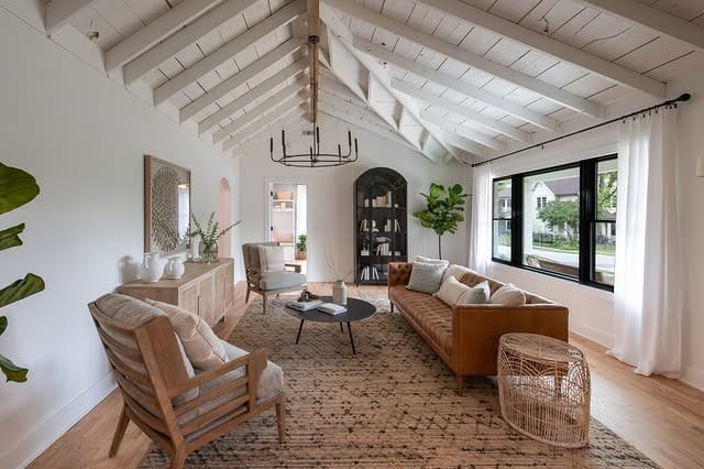 11. White and Camel Rustic Living Room with Vaulted Beams - rustic living room ideas