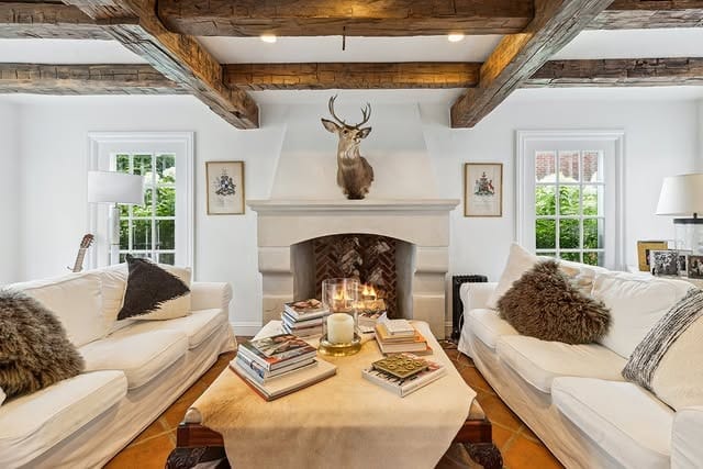 12. Cream and Weathered Wood Rustic Fireplace Living Room - rustic living room ideas