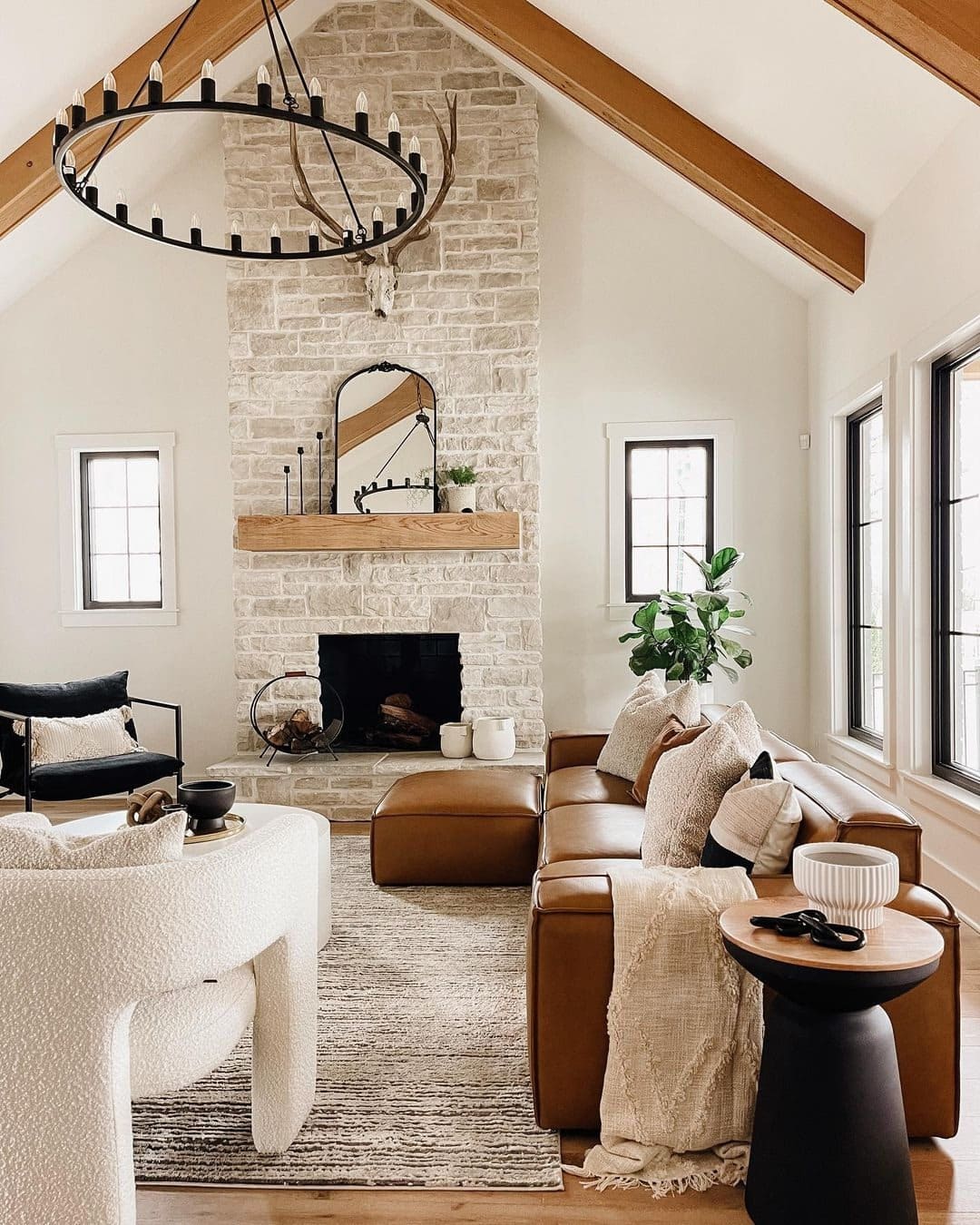 22. Cream and Camel Rustic Living Room with Stone Fireplace - rustic living room ideas
