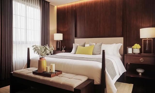 14. Warm Walnut and Cream Classic Bedroom - warm bedroom ideas