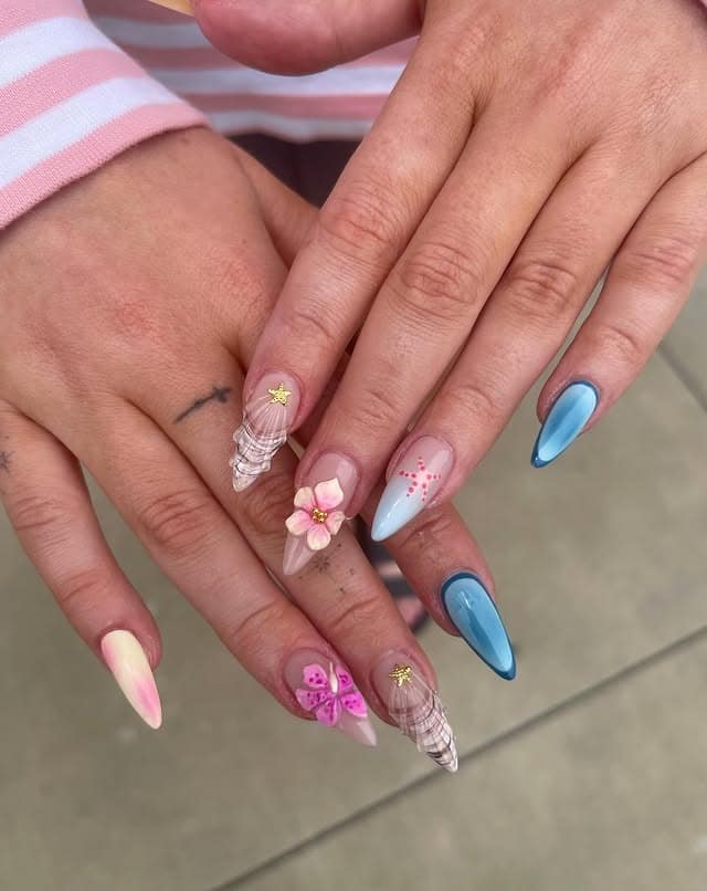 2. Tropical Blue and Pink 3D Floral Almond Nails - beach nail ideas