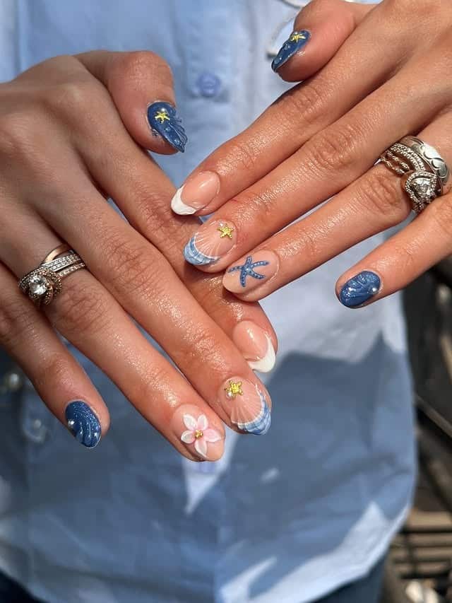 3. Coastal Blue Seashell and Starfish Nails - beach nail ideas