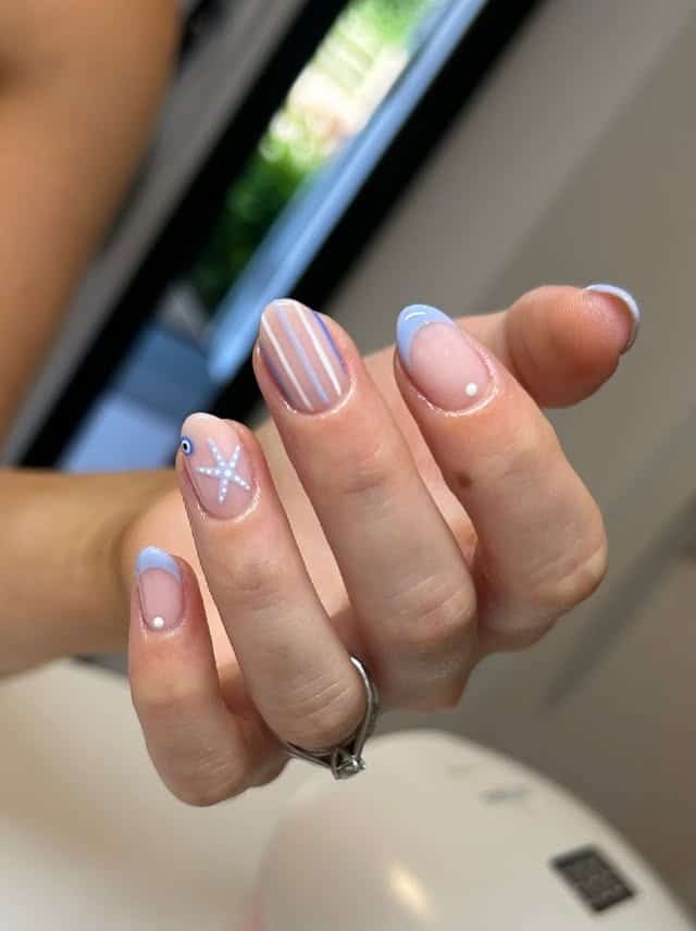 6. Minimal Blue French Tip Beach Nails - beach nail ideas