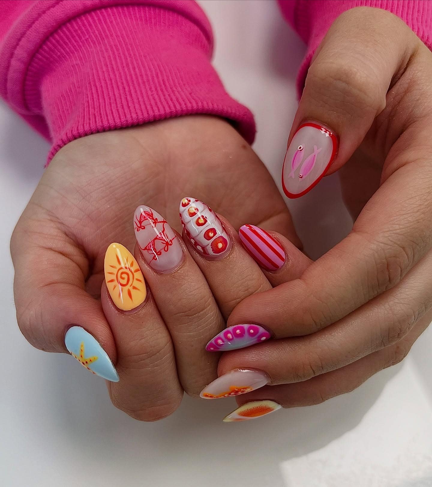 7. Colorful Beach Art Almond Nails - beach nail ideas
