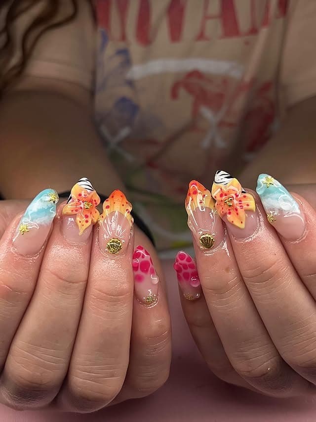 9. Tropical Hibiscus and Ocean Wave Nails - beach nail ideas