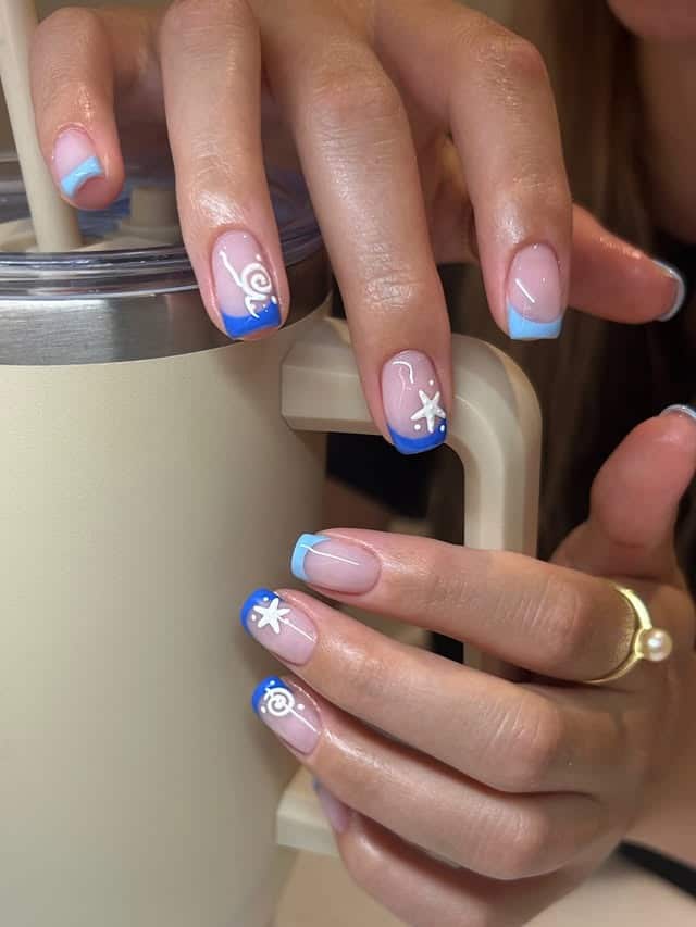11. Sky Blue French Tip Starfish Nails - beach nail ideas