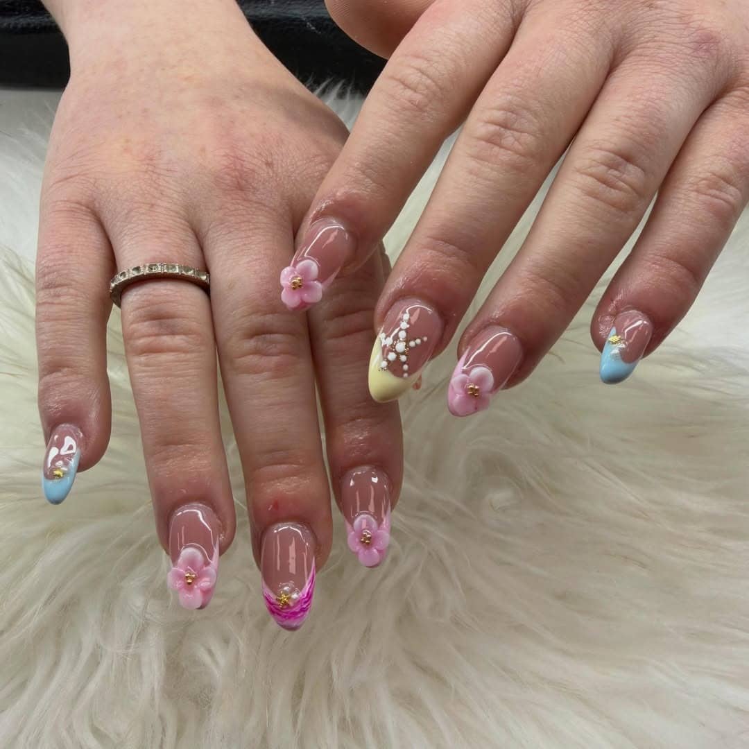 8. Pastel French Almond Nails with Pink 3D Flower Accents - holiday nail ideas