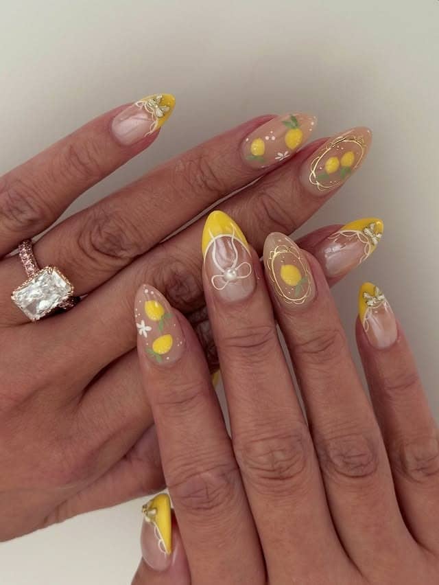 13. Lemon Yellow French Almond Nails with Citrus Nail Art - holiday nail ideas