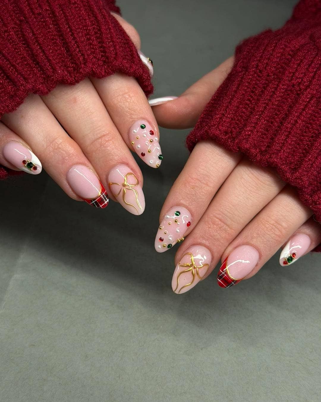 14. Nude Pink Almond Nails with Plaid French Tips and Gold Bow Art - holiday nail ideas