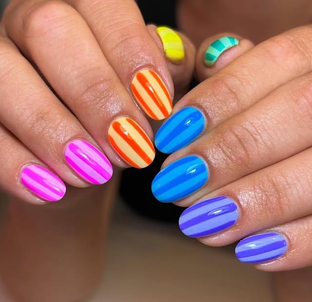 17. Rainbow Stripe Oval Nails in Bright Summer Colors - holiday nail ideas