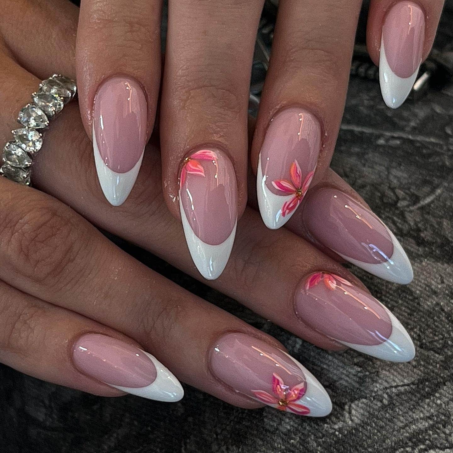 20. Classic White French Almond Nails with Pink Floral Accents - holiday nail ideas