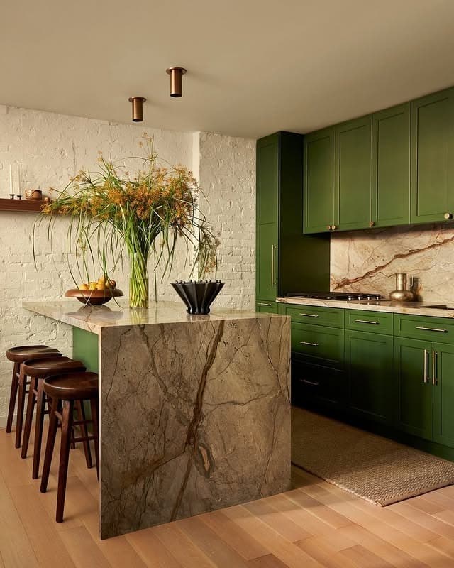 11. Olive Green Kitchen With Dramatic Stone Waterfall Island - green kitchen ideas