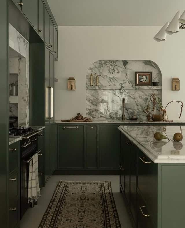 14. Deep Moss Green Kitchen With Marble Feature Wall - green kitchen ideas