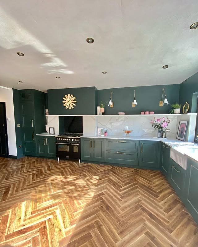 15. Dark Green Kitchen With Herringbone Wood Flooring - green kitchen ideas