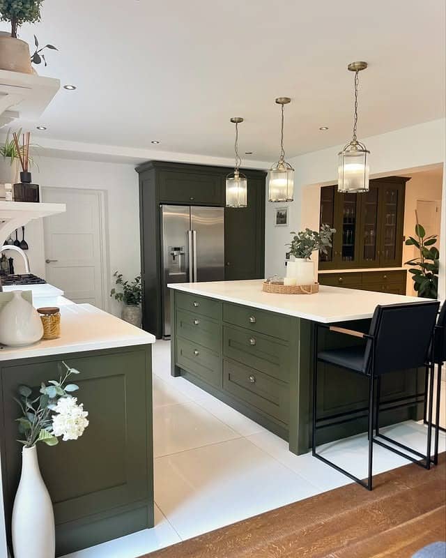 16. Forest Green Island Kitchen With Classic Lantern Lighting - green kitchen ideas