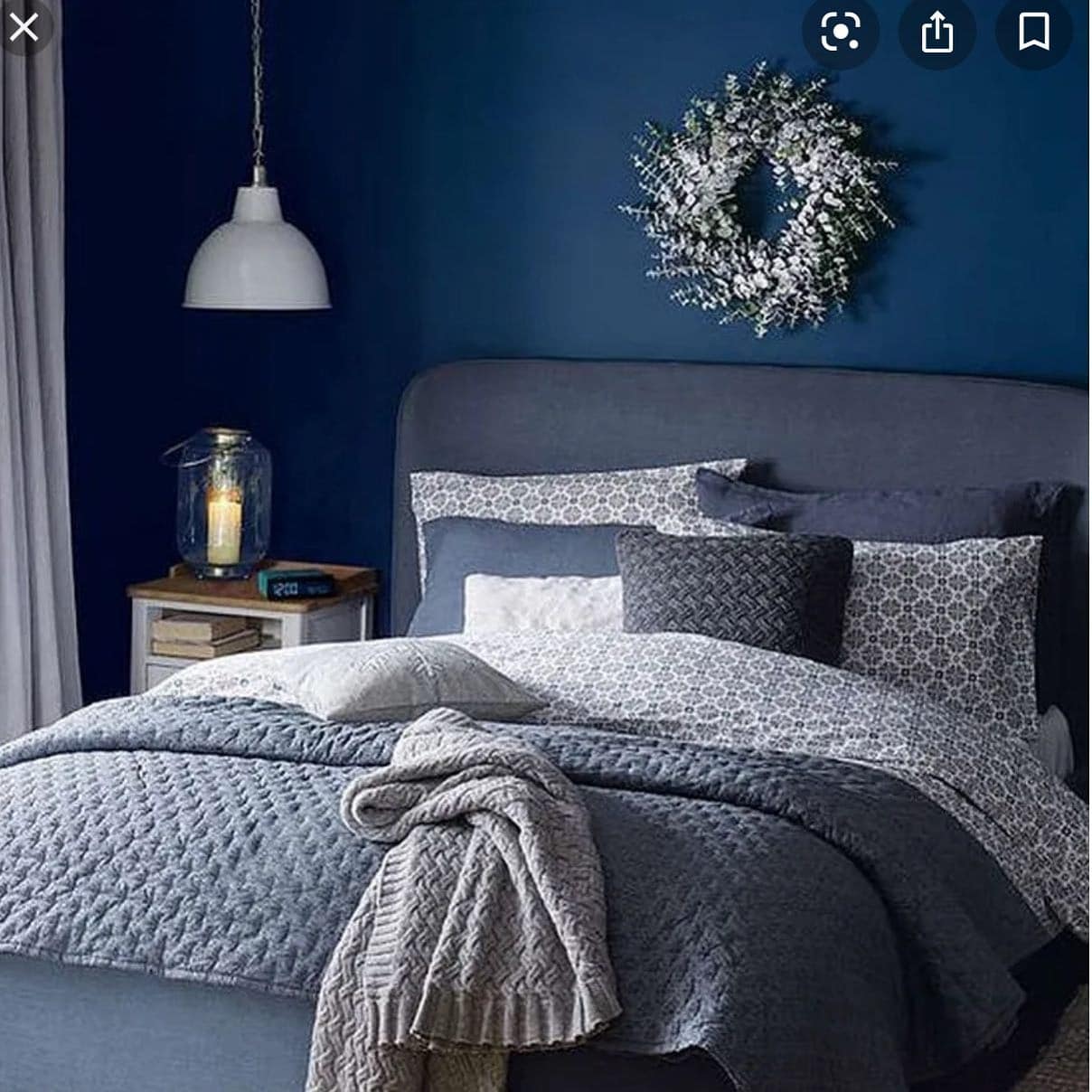 5. Moody Navy Bedroom with Layered Gray Textures - navy bedroom ideas