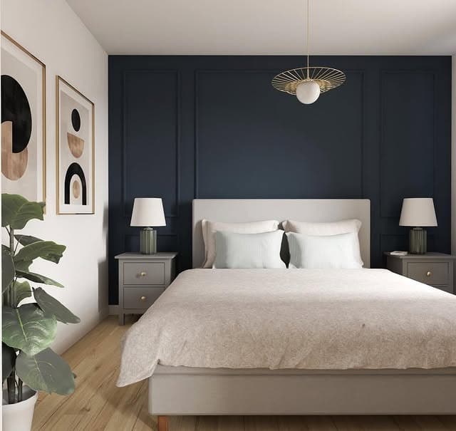 22. Modern Navy Panel Wall Bedroom with Soft Neutrals - navy bedroom ideas