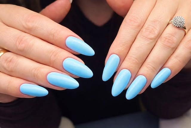2. Matte Sky Blue Almond Nails - light blue nail ideas