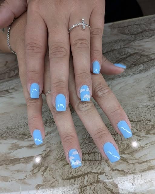 3. Light Blue Cloud Accent Square Nails - light blue nail ideas