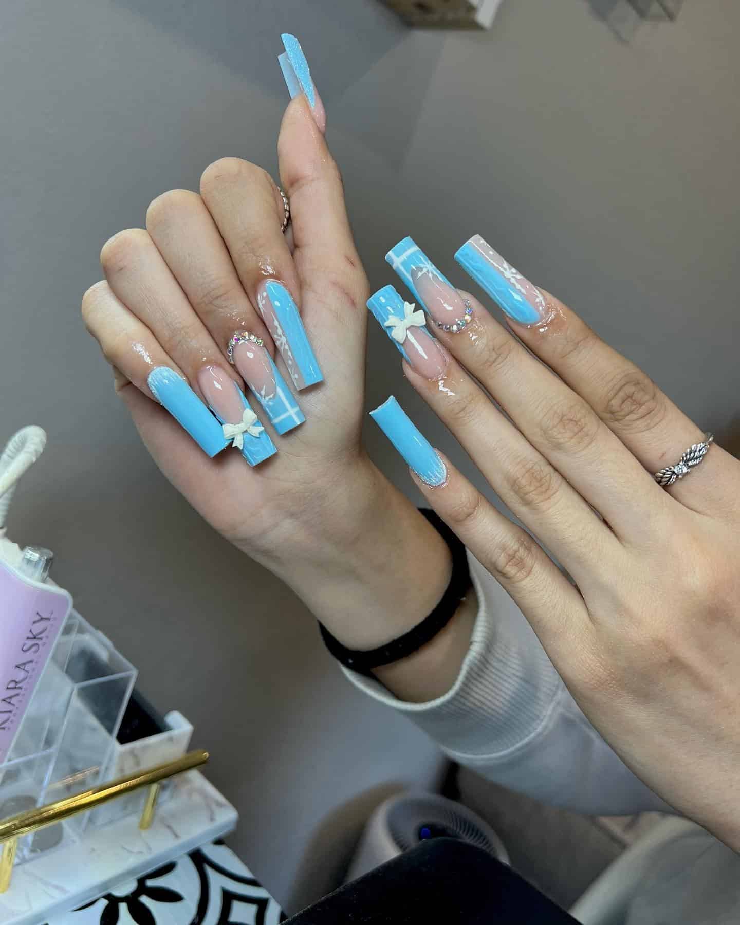 8. Light Blue Bow and Rhinestone Coffin Nails - light blue nail ideas