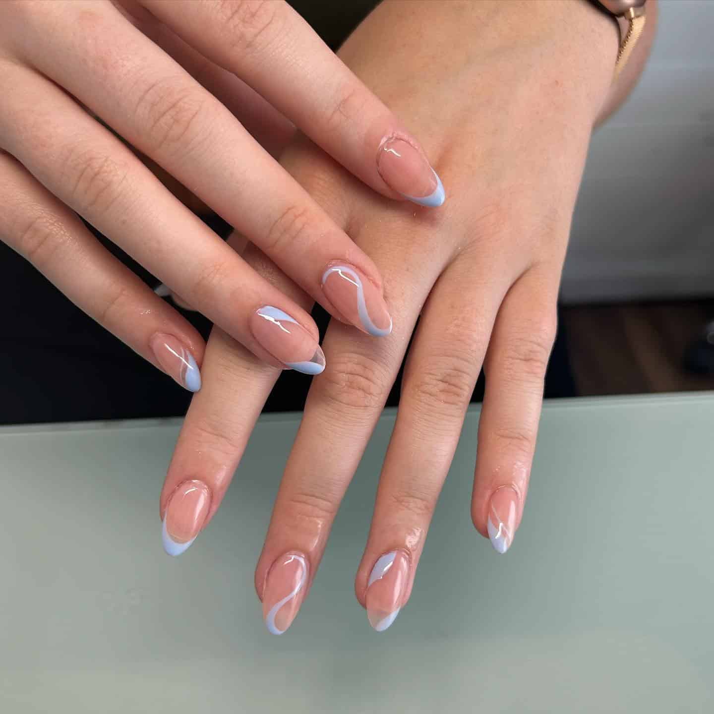 12. Swirl French Light Blue Almond Nails - light blue nail ideas