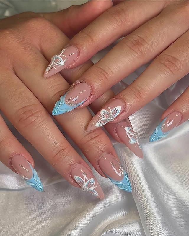 18. Light Blue Floral Art Stiletto Nails - light blue nail ideas