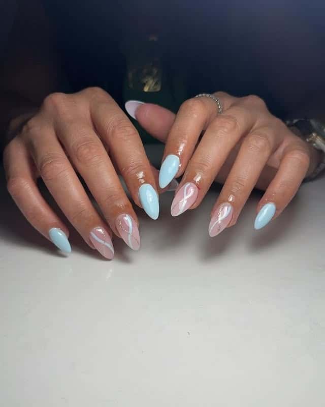 19. Pastel Light Blue and Pink Almond Nails - light blue nail ideas