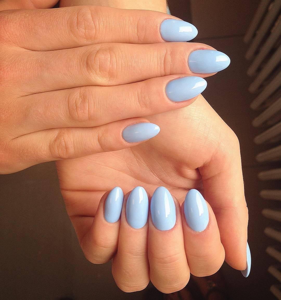 20. Classic Glossy Light Blue Almond Nails - light blue nail ideas