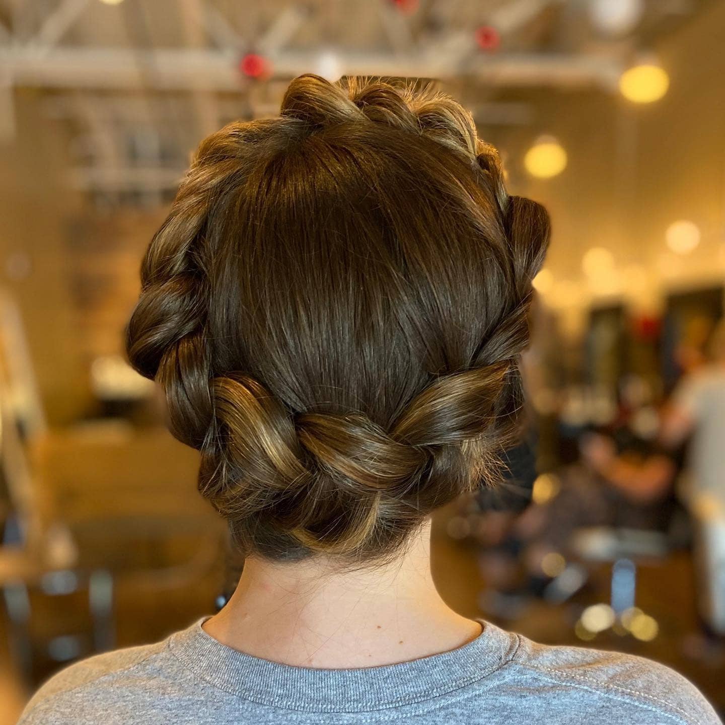 2. Espresso Brown Crown Braid Low Bun - Crown Braid Hairstyles
